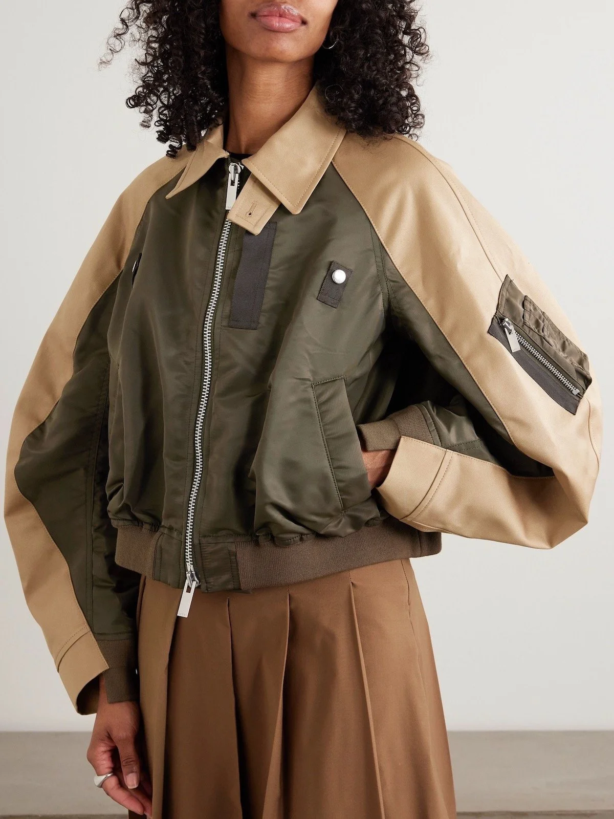 Sacai Oversized Cotton-Canvas and Shell Bomber Jacket in Army Green, $1,420 at Net-a-Porter