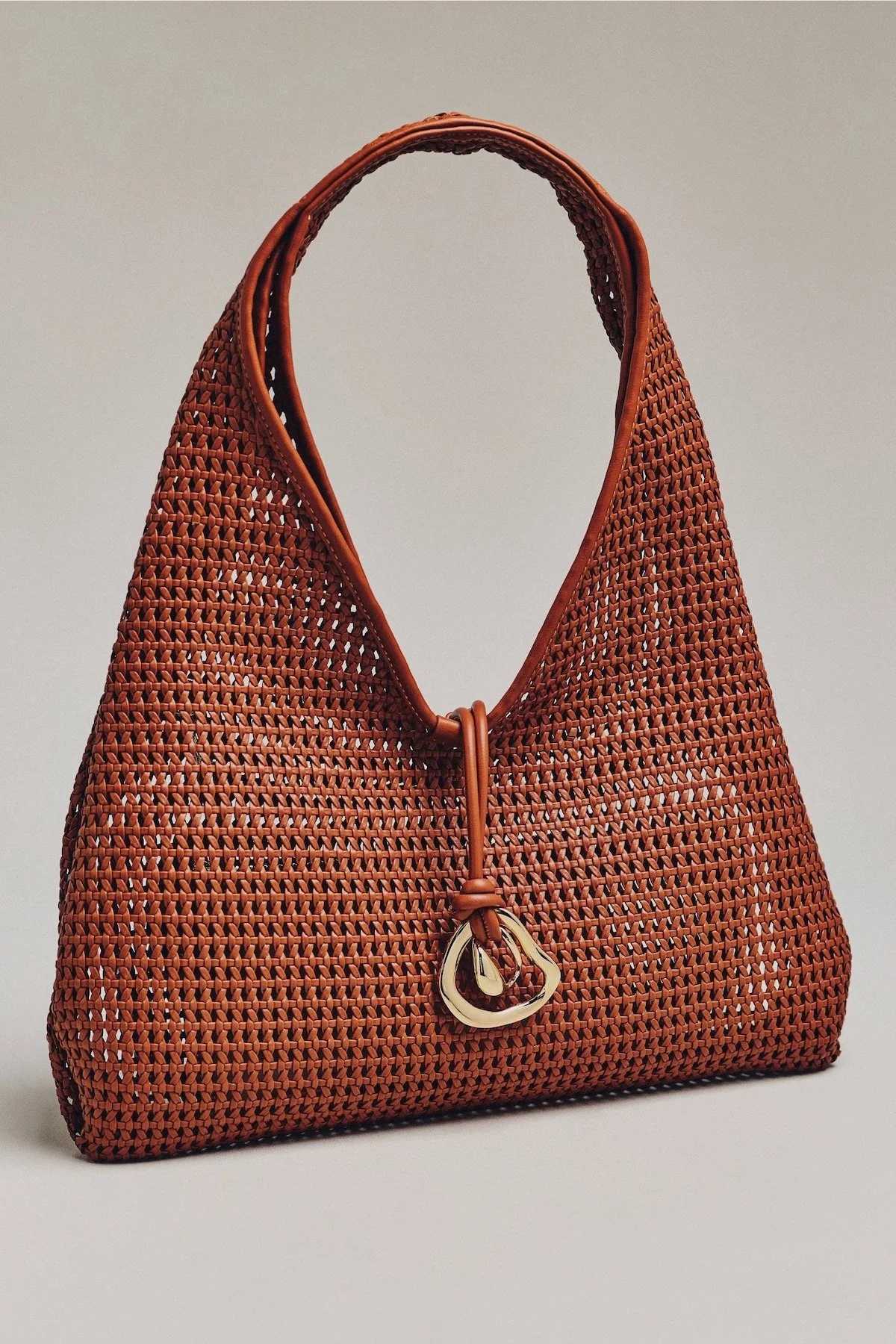 Dolce Vita Missie Raffia Mesh Tote in Cognac, $215 at Anthropologie