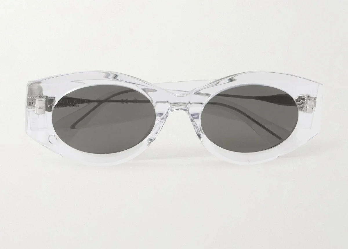 Alaïa Eyewear Lettering Round-Frame Acetate Sunglasses in Clear, $425 at Net-a-Porter