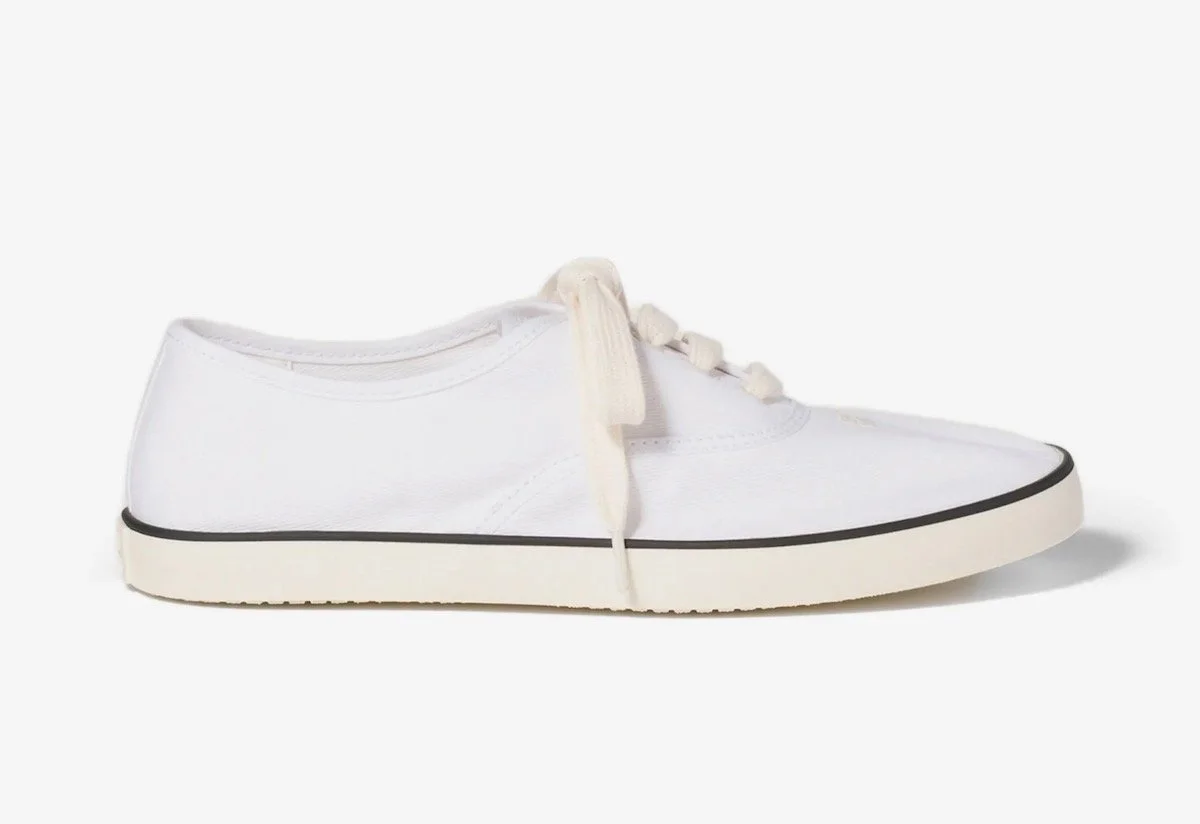 Miu Miu Logo-Embroidered Sneakers, $925 at Farfetch