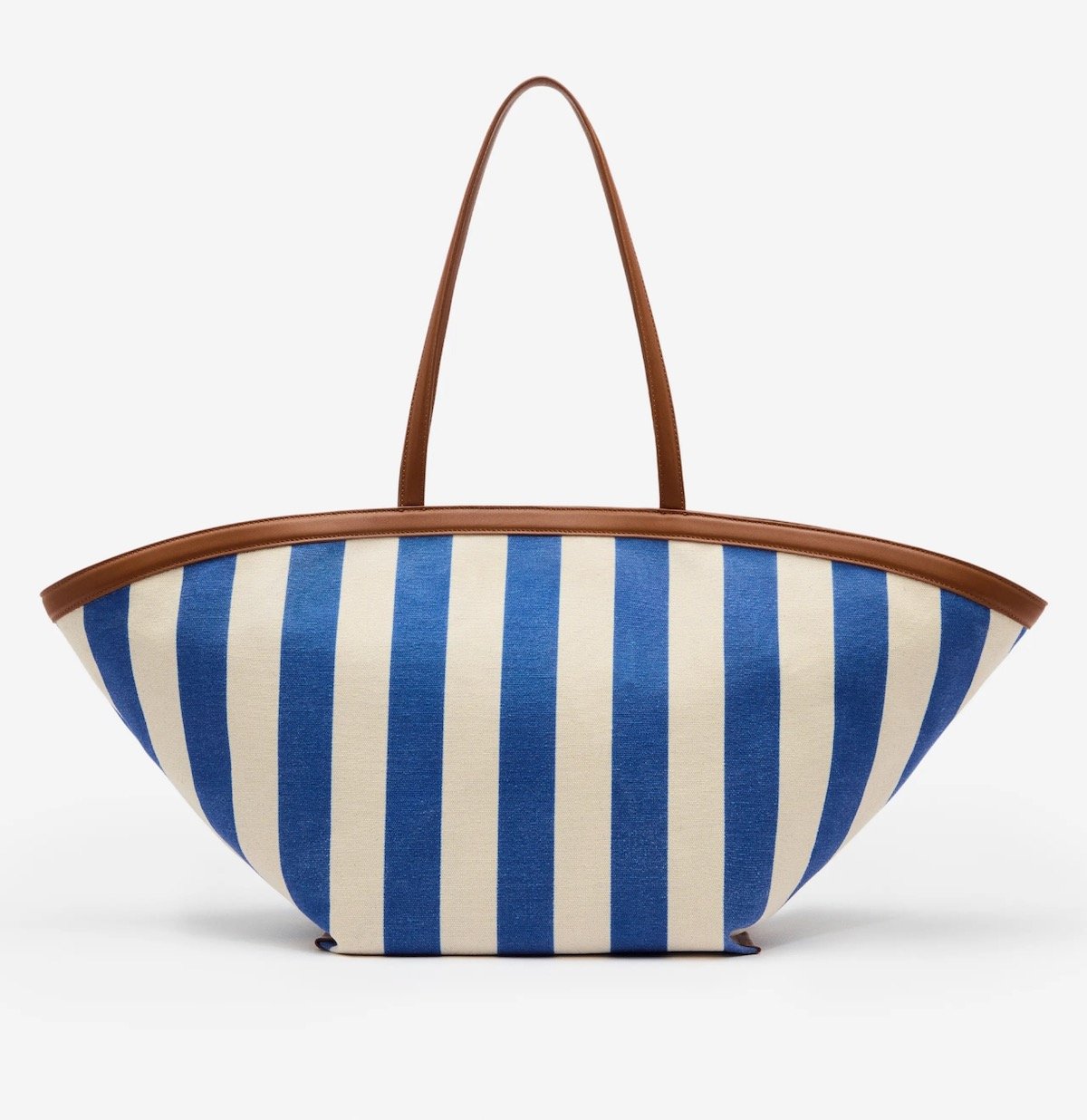 Reformation Lucia Tote Bag in Cassis Blue Stripe Canvas, $298 at Reformation