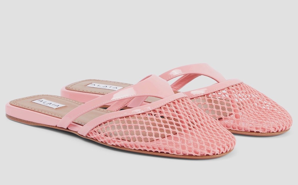 Alaïa Patent Leather-Trimmed Fishnet Mules, $1,000 at Mytheresa
