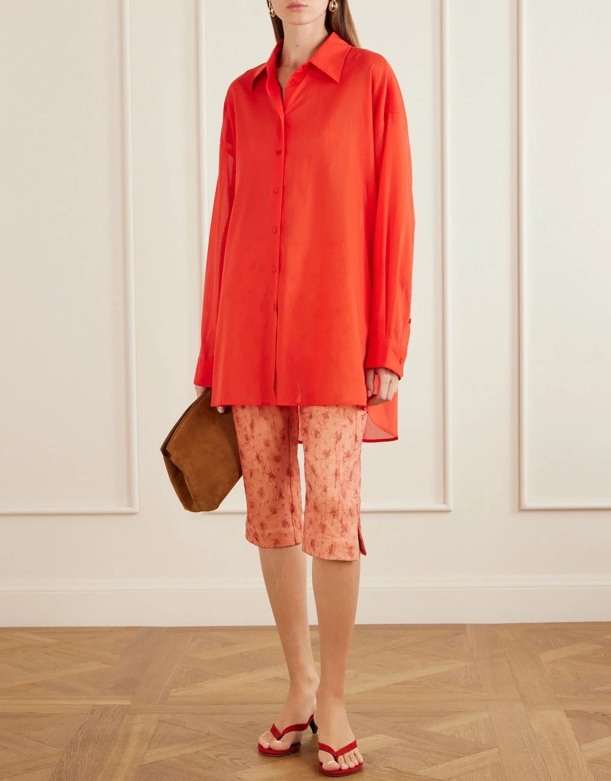 Ganni Floral-Print Crinkled Shibori-Organza Skinny-Leg Capri Pants, $261 at Net-a-Porter
