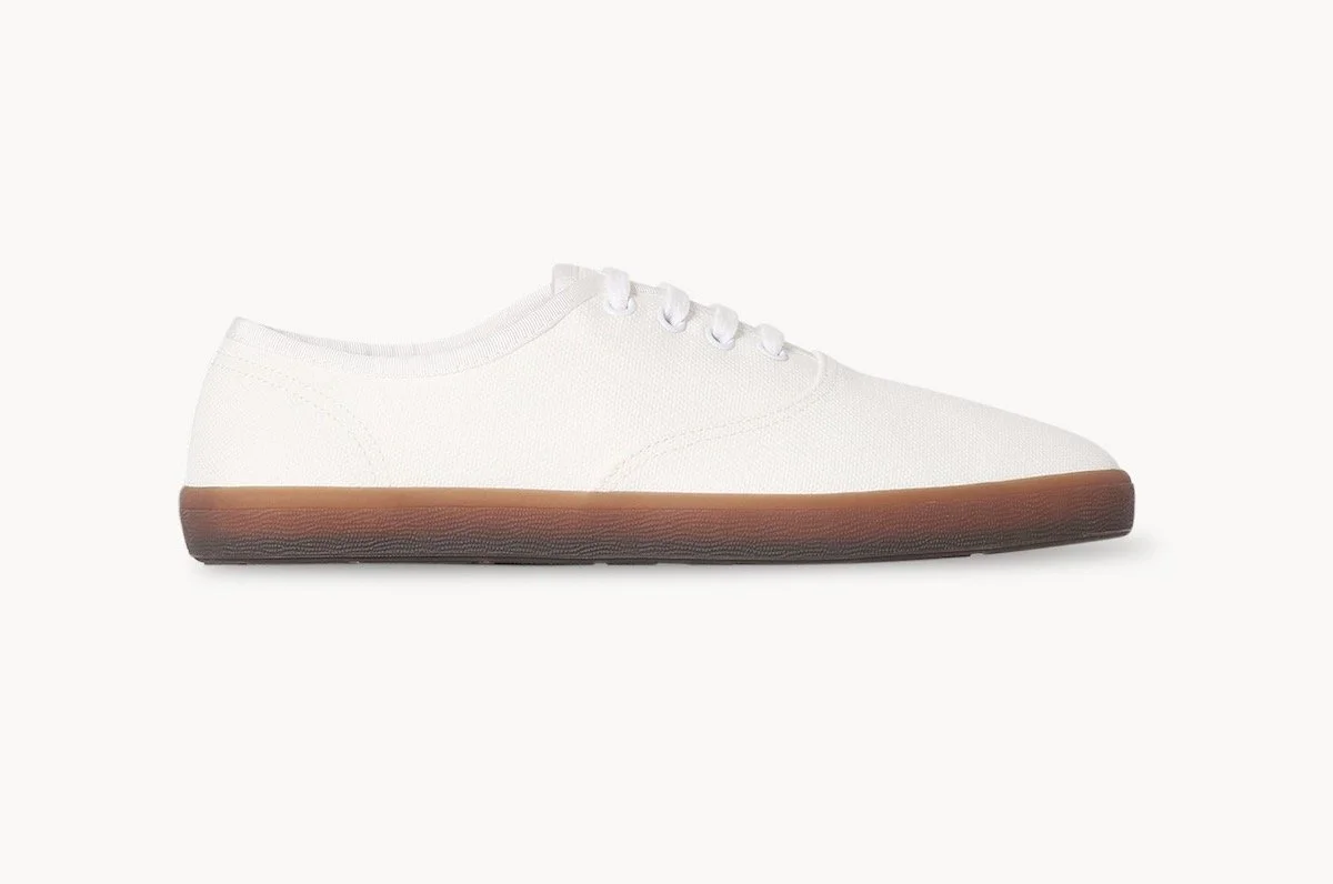 The Row Fynn Sneaker in Ivory/Smocked Brown, $890 at The Row