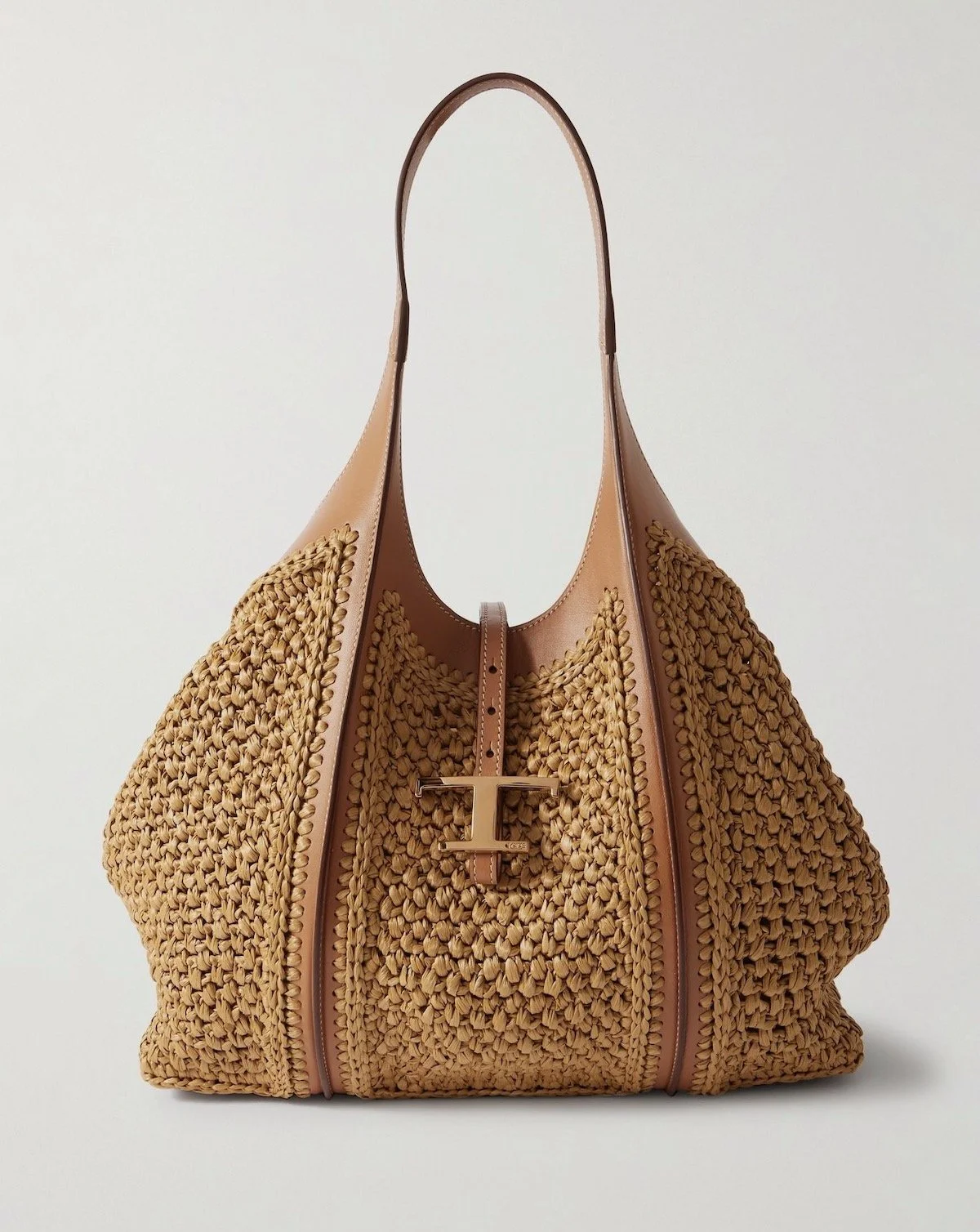 Tod’s T Timeless Leather-Trimmed Raffia Shoulder Bag, $3,645 at Net-a-Porter