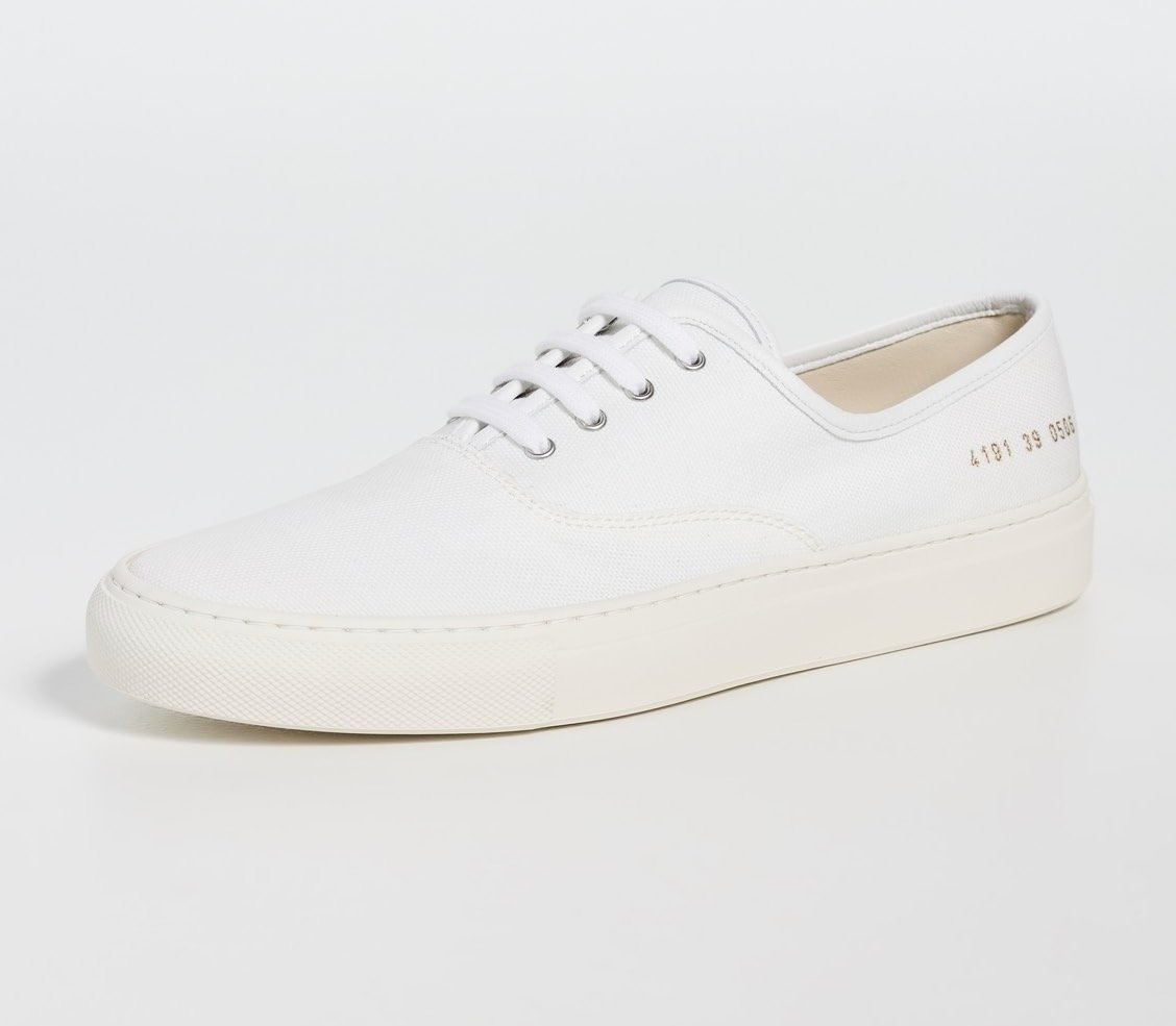 Common Projects Four Hole Slip On Sneakers, $565 at Shopbop