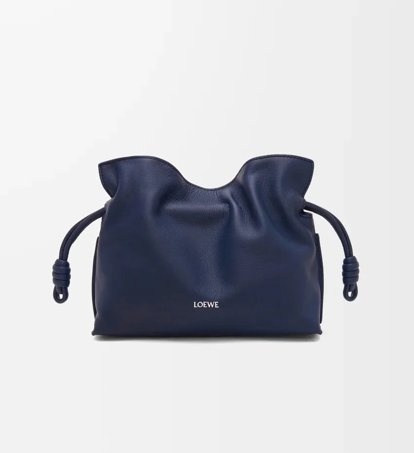 Loewe Mini Flamenco Clutch in Nappa Calfskin in Abyss Blue, $2,600 at Loewe
