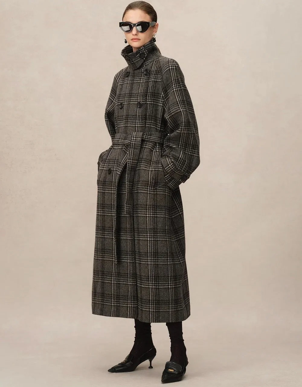 Tea Chakhnashvili With Fabrique Edit Convertible Funnel Neck Coat in Welsh Checkered Box Wool, $698 at Fabrique