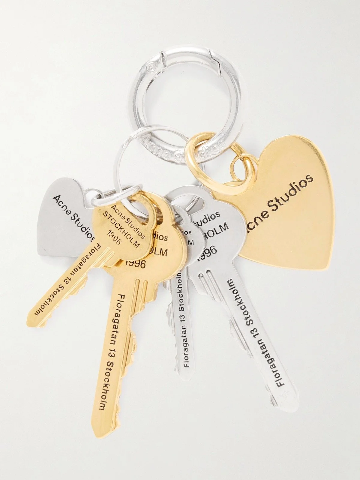 Acne Studios Silver- and Gold-Tone Keyring, $324 at Net-a-Porter