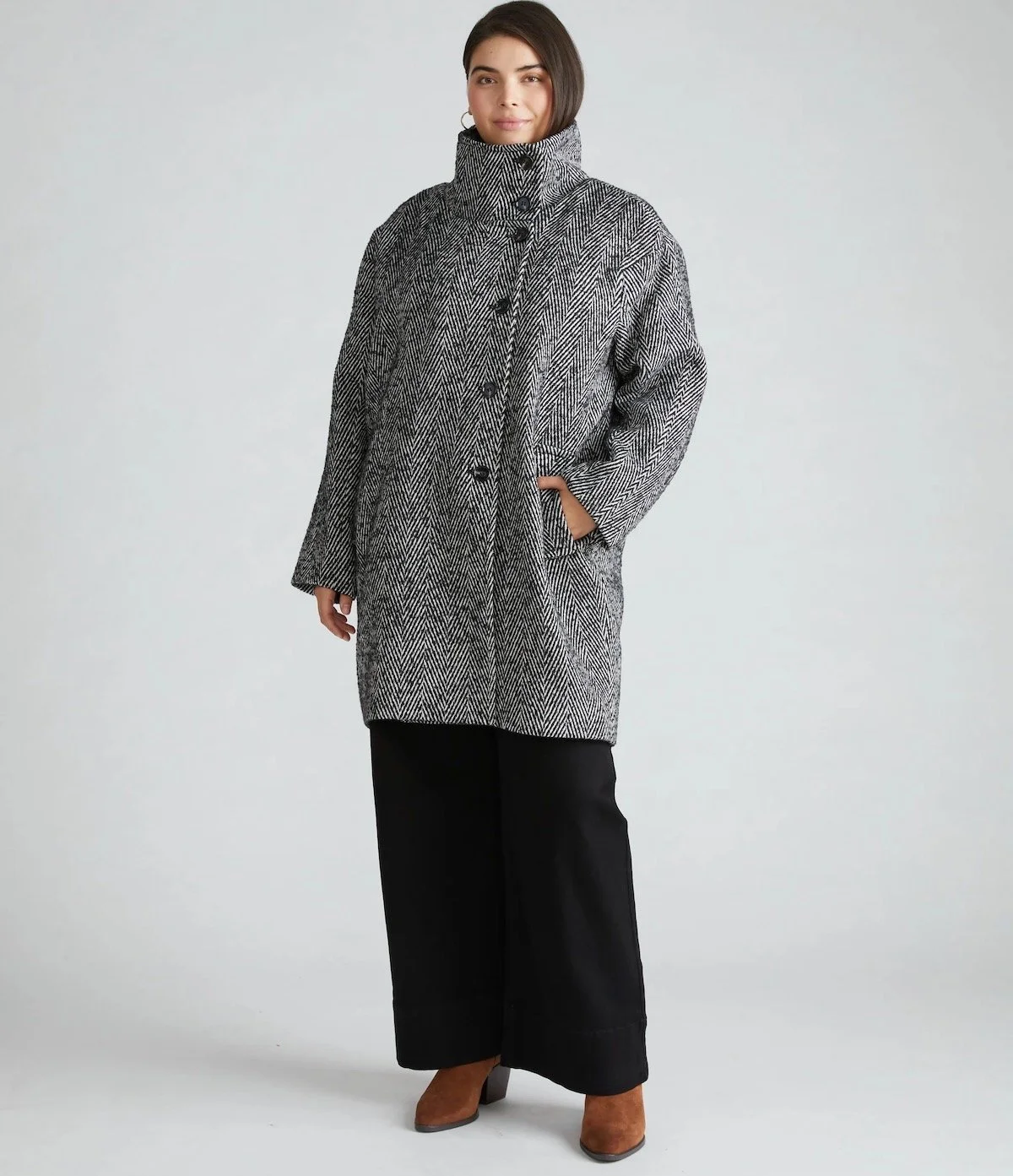 Universal Standard Marlo Cocoon Coat in Herringbone, $348 at Universal Standard