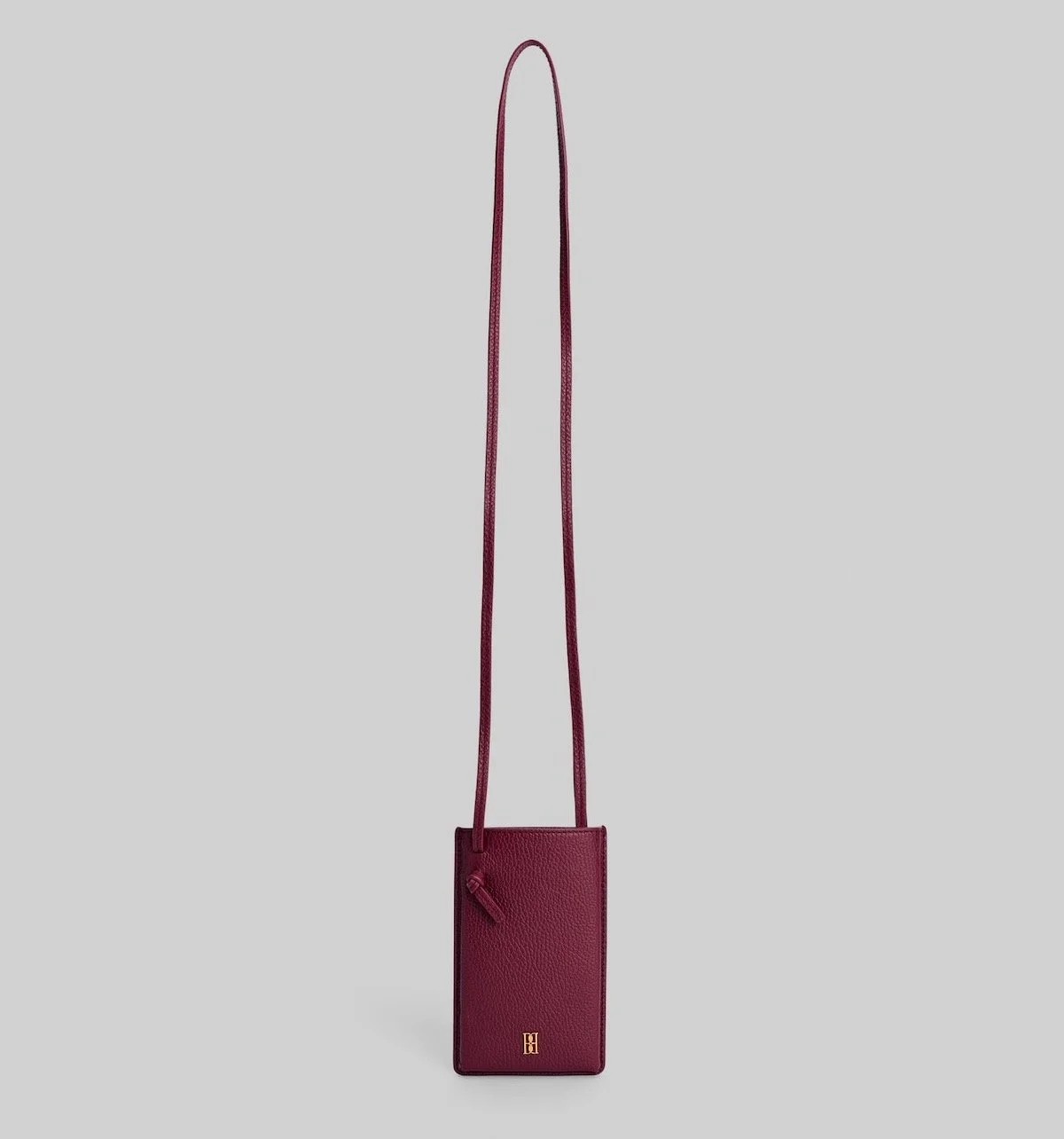 By Malene Birger Aya Phone Leather Pouch in Cabernet, $240 at The Frankie Shop