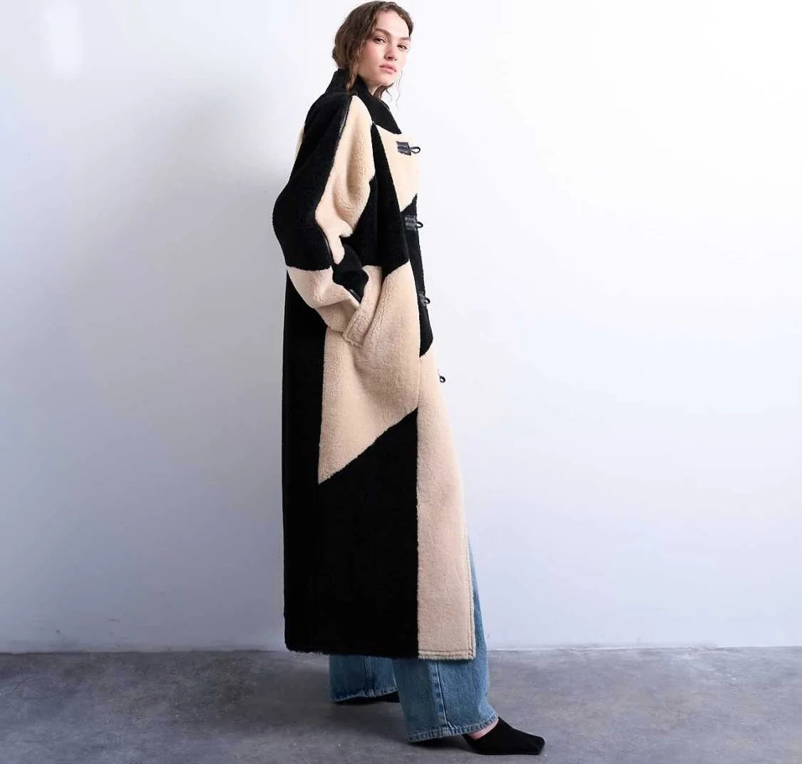 Topshop Borg Longline Ovoid Sleeve Patchwork Coat in Black, $189 at ASOS