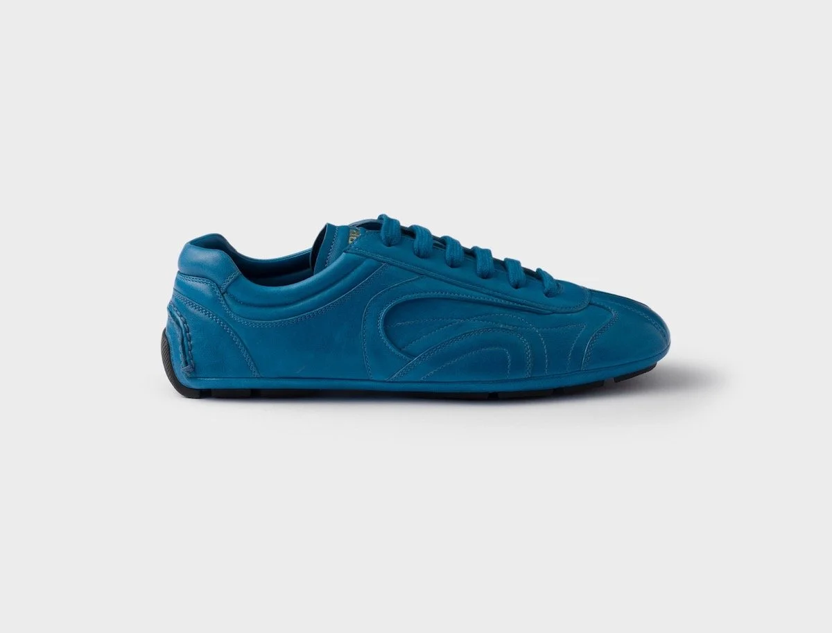 Prada Montecarlo Re-Edition 2005 Antiqued Nappa Leather Sneakers in Ocean Blue, $1,100 at Prada