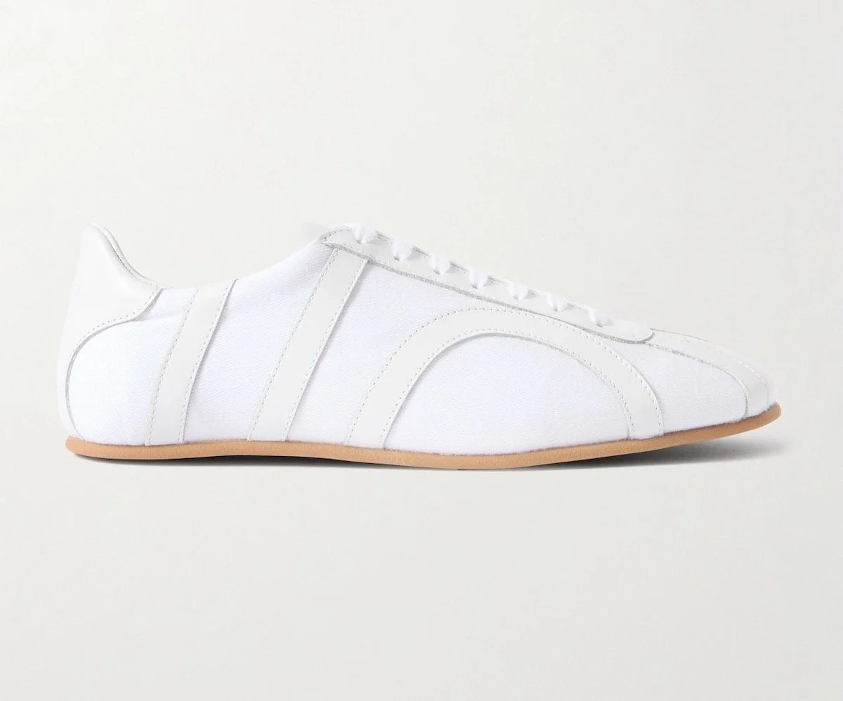 TOTEME Leather-Trimmed Cotton-Canvas Sneakers in White, $450 at Net-a-Porter
