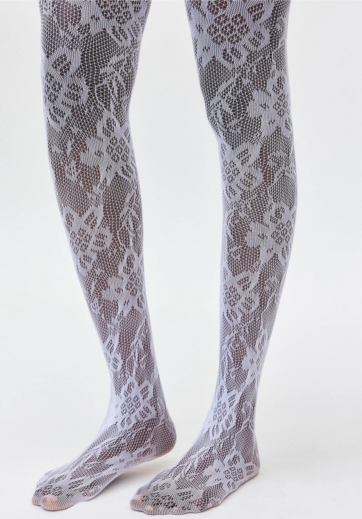 Urban Outfitters Ella Lace Tights in White, $20 at Urban Outfitters