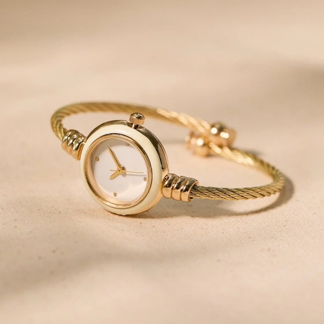 Altar'd State White Enamel Twisted Cuff Round Face Watch, $36 at Altar'd State