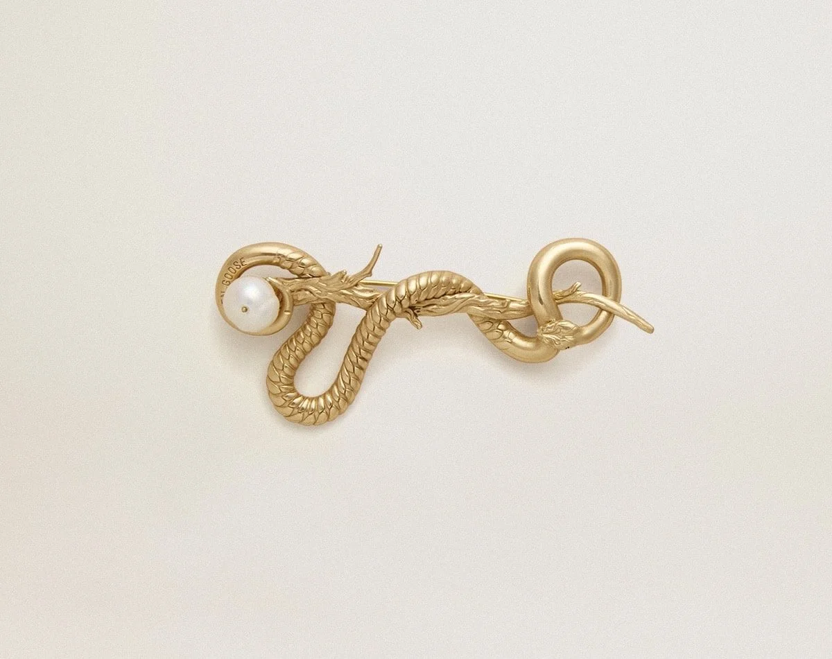 Golden Goose CNY Antique Gold Snake-Shaped Pin, $180 at Golden Goose