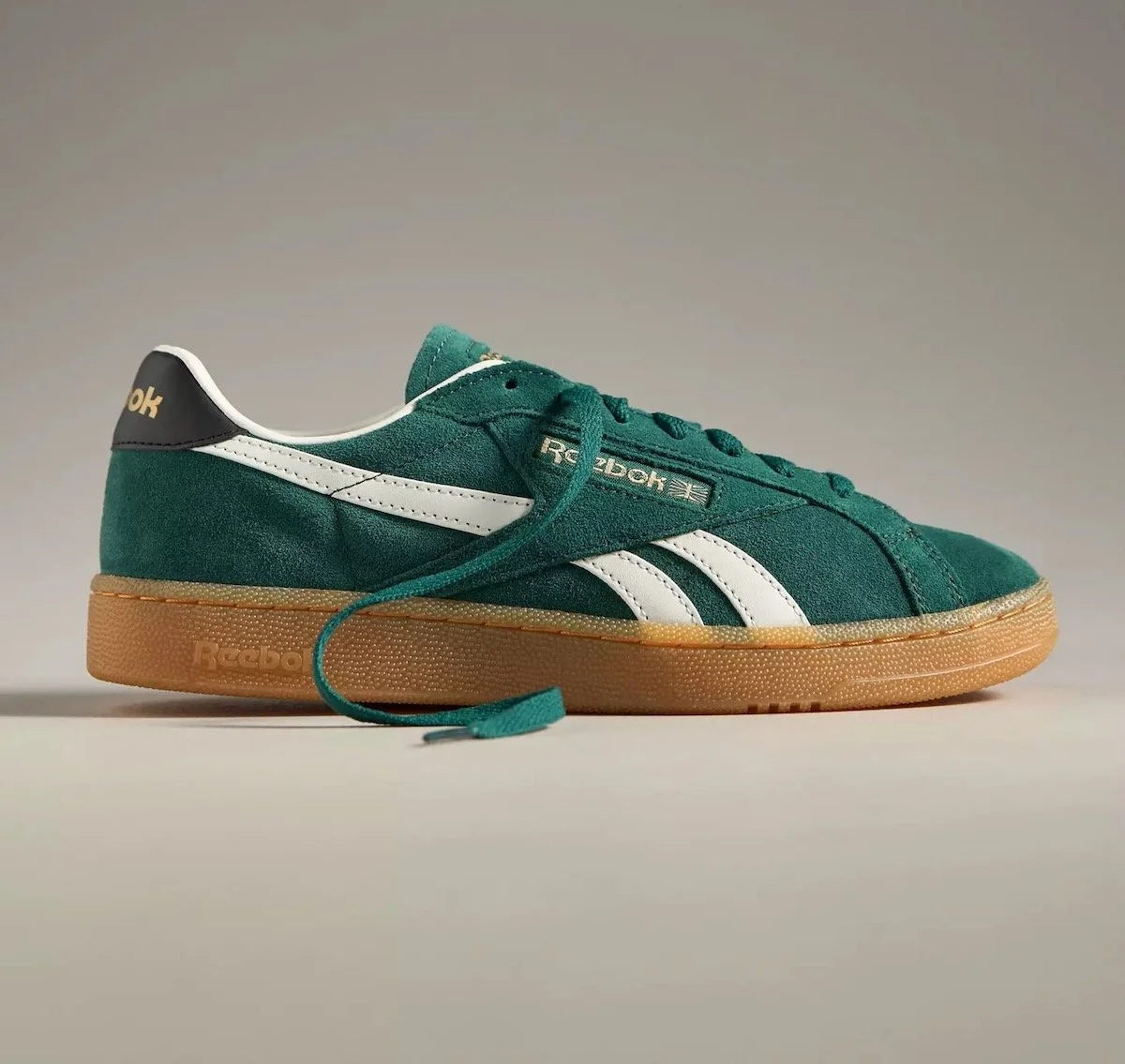 Reebok Club C Grounds Sneakers in Collegiate Green/Black/Gum, $70 at Anthropologie
