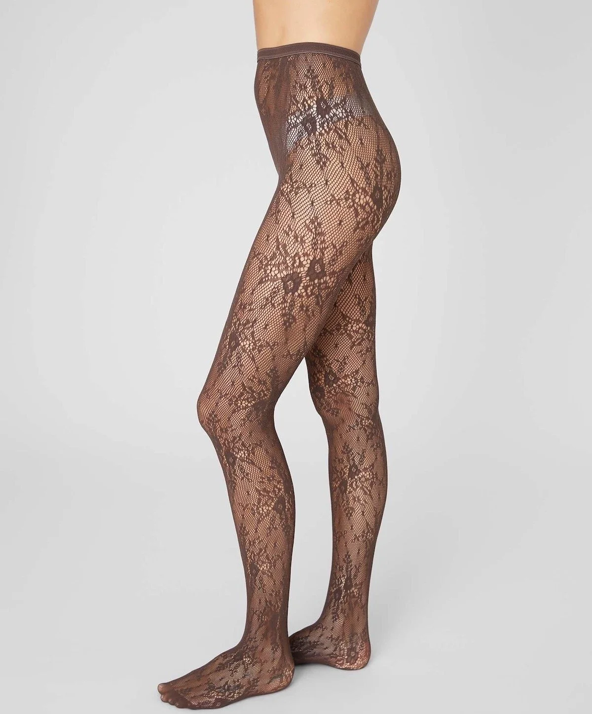Swedish Stockings Rosa Lace Tights in Dark Brown Net, $59 at Swedish Stockings
