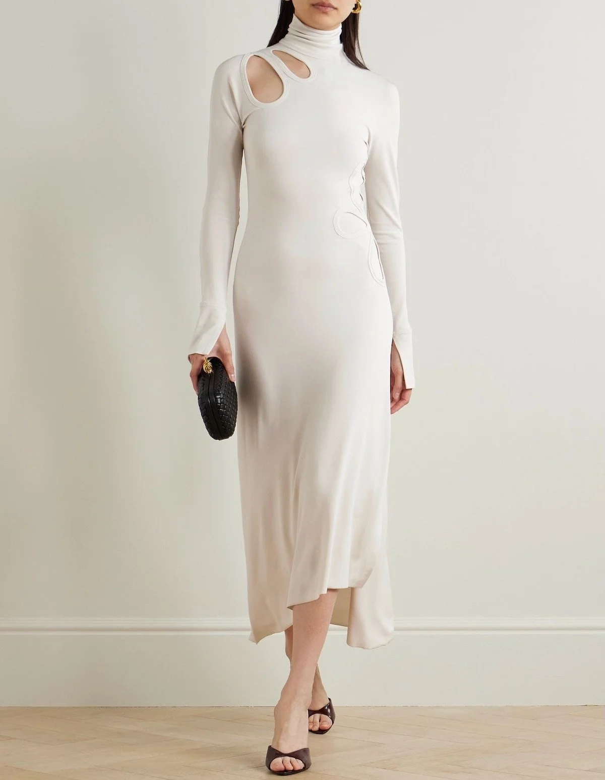 Victoria Beckham Cutout Asymmetric Stretch-Jersey Turtleneck Midi Dress, $465 at Net-a-Porter