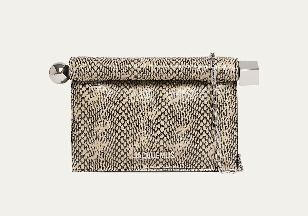 Jacquemus La Petit Pochette Rond Snakeskin-Embossed Clutch Bag, $1,090 at Bergdorf Goodman