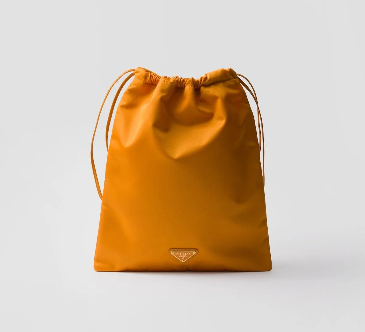 Prada Wish Re-Nylon Pouch in Amber, $795 at Prada