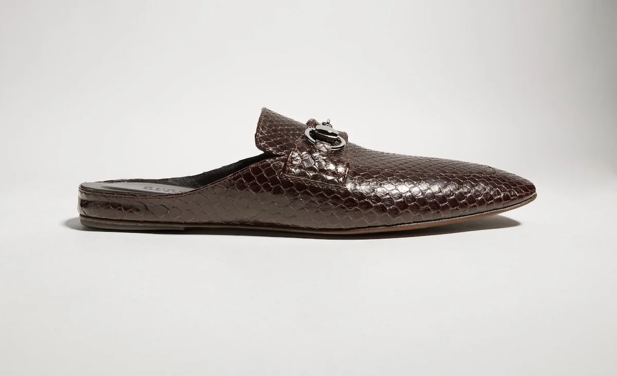 Gucci Ragazzo Python Mule in Black, $1,380 at Gucci