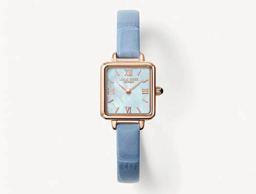 Lola Rose Mother of Pearl Watch With Blue Leather Strap, $209 at Lola Rose
