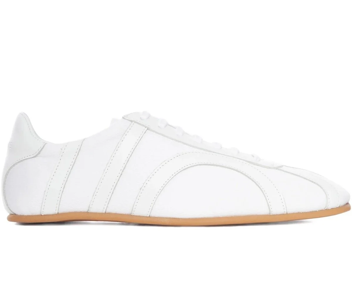 TOTEME Leather-Panel Lace-Up Sneakers, $251 at Farfetch