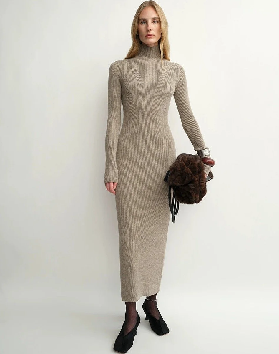 The Artm Merino Rib Turtleneck Dress in Heathered Camel, $235 at Atorie