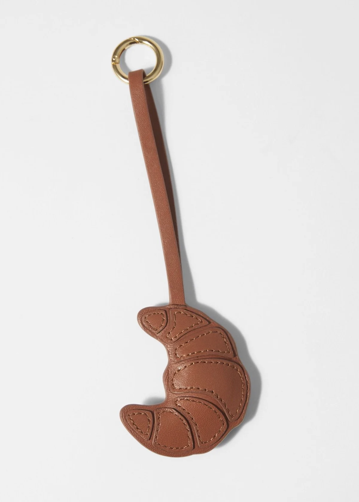 & Other Stories Leather Croissant Keyring, $45 at & Other Stories