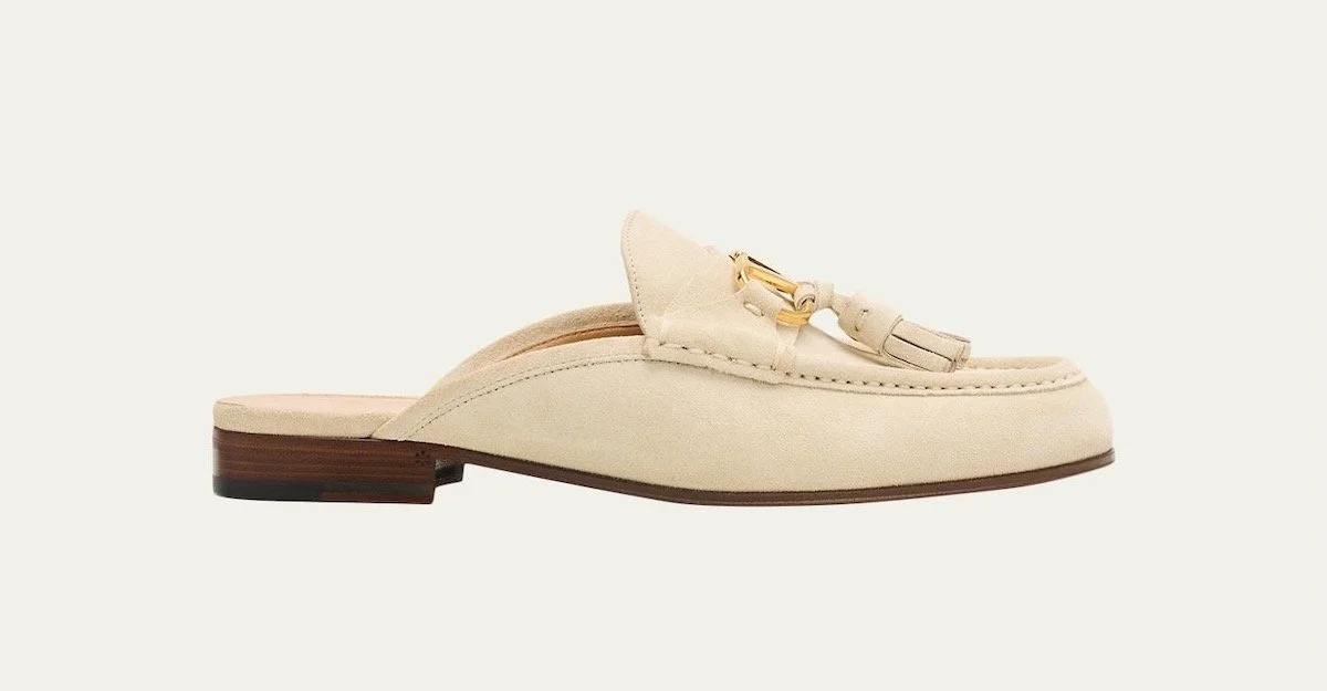 Valentino Garavani VLogo Signature Suede Loafer Mules in Cream, $1,100 at Bergdorf Goodman