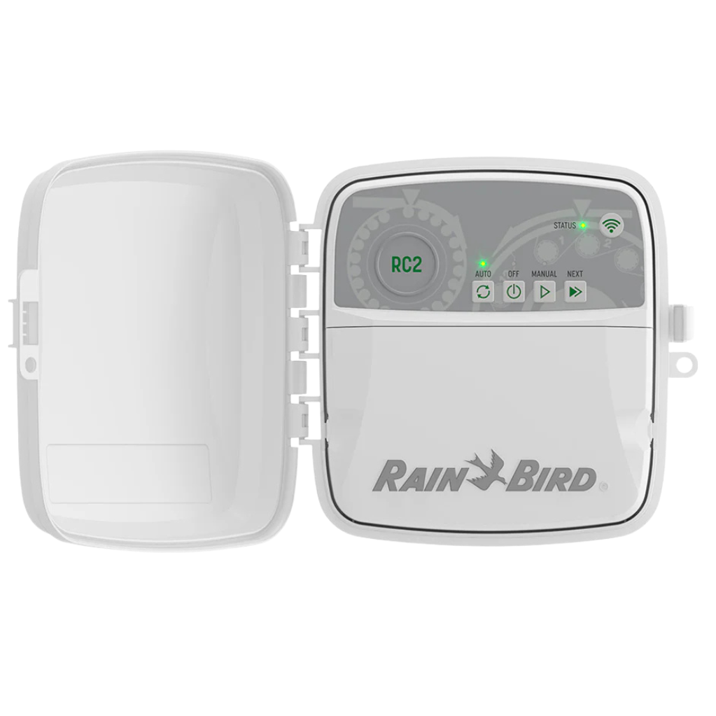 Rain Bird irrigation controller with open lid revealing control buttons and status lights.