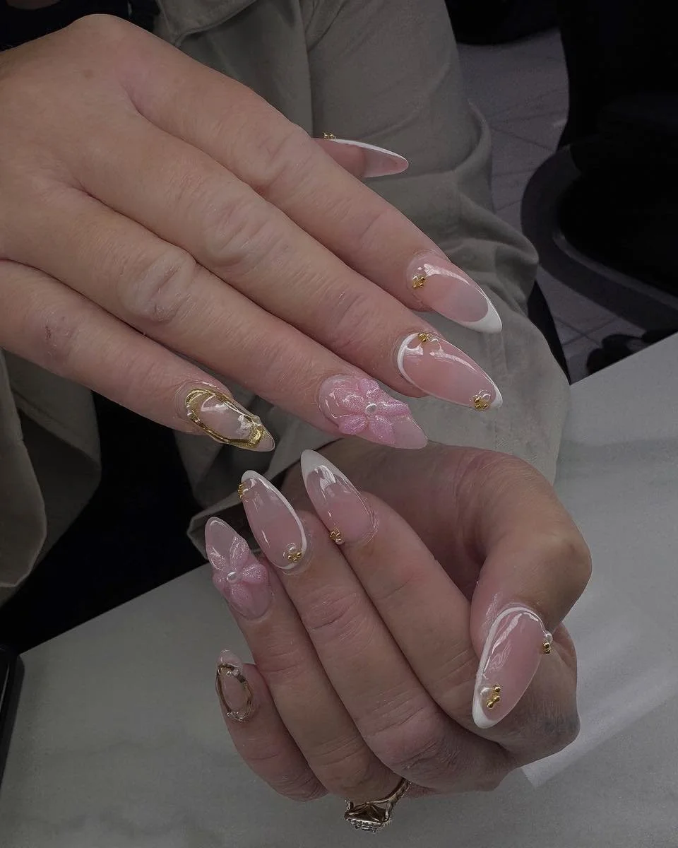 Pink nails with some designs 
#nailart #frenchtipnails #3Dnails #pinknails #goldnails #elegantnails #glossynails #coffinnails #almondnails #naildesign #nailinspo #nailartist #cutestyle #prettynails #nailfashion #nailtrends #flowernails