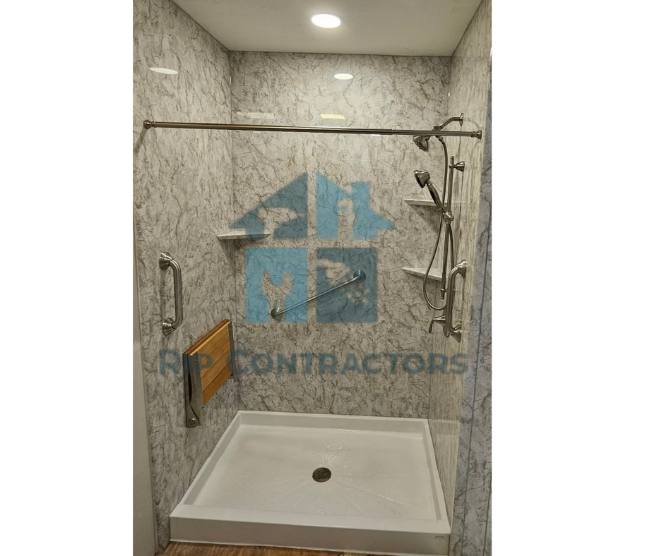 Walk in shower with Castico wall system, built in shelves, grab bars, and folding seat for added room and comfort