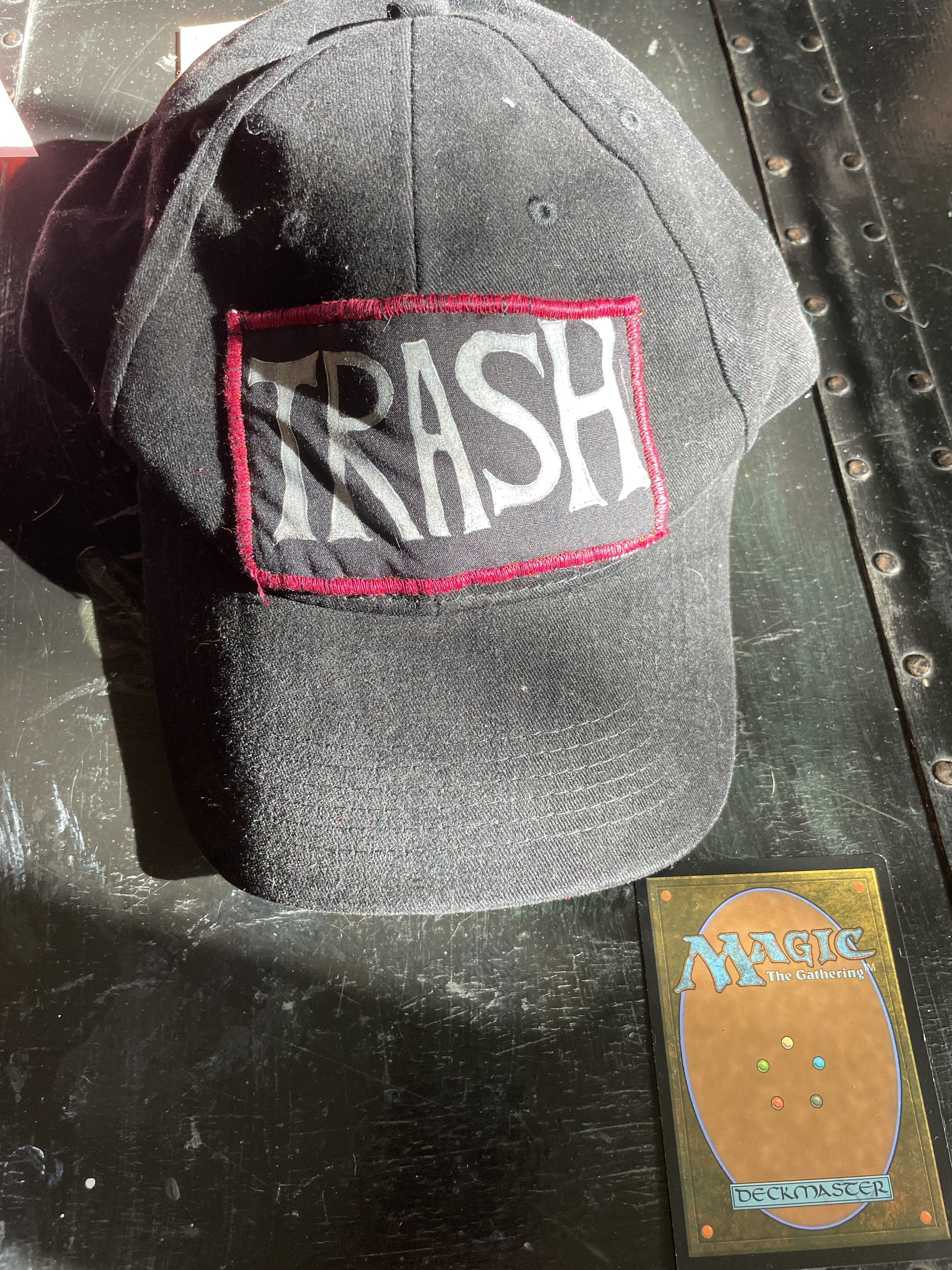 trash trucker hat.png