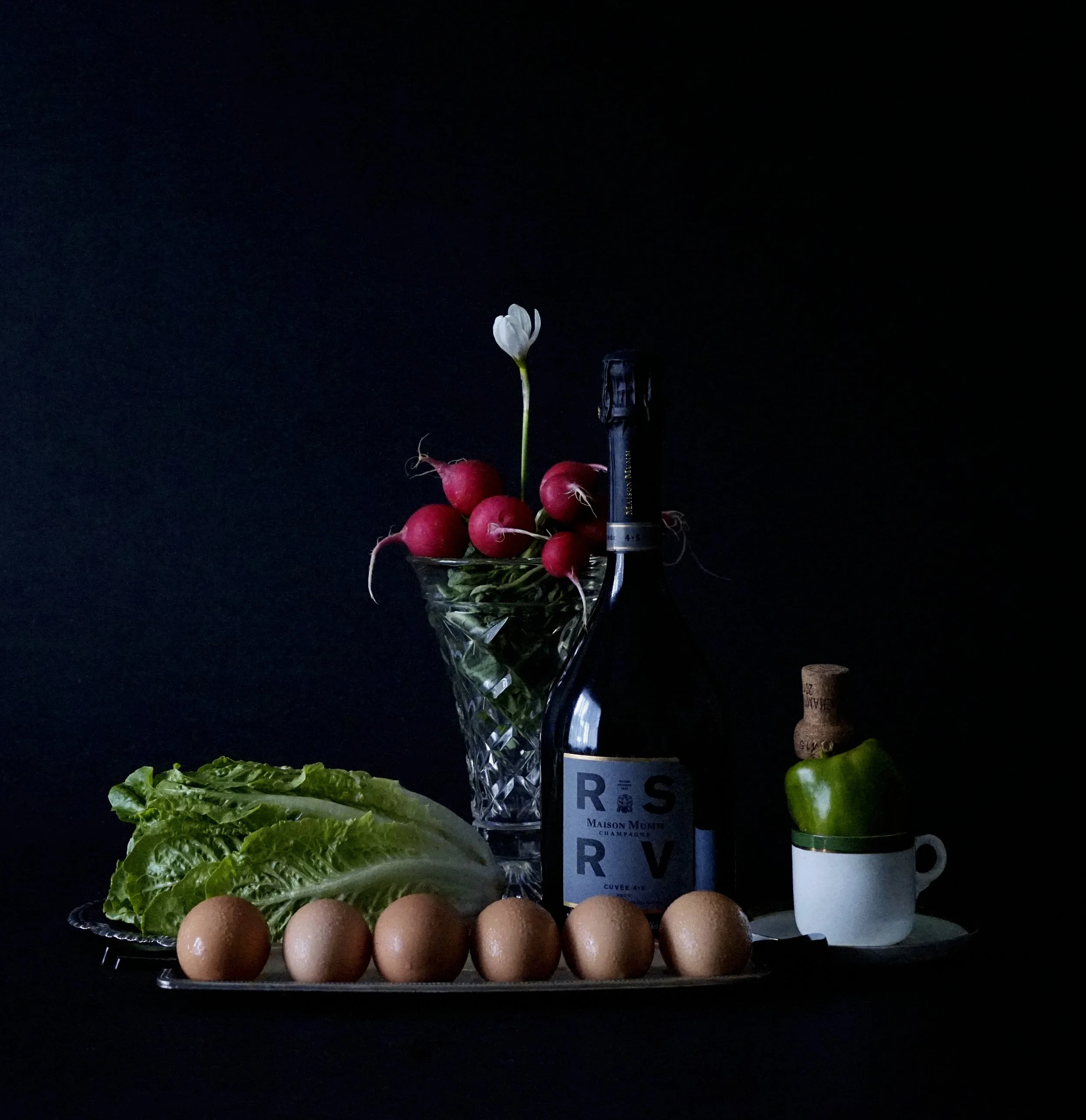 Champagne and eggs still life, product styling and photography