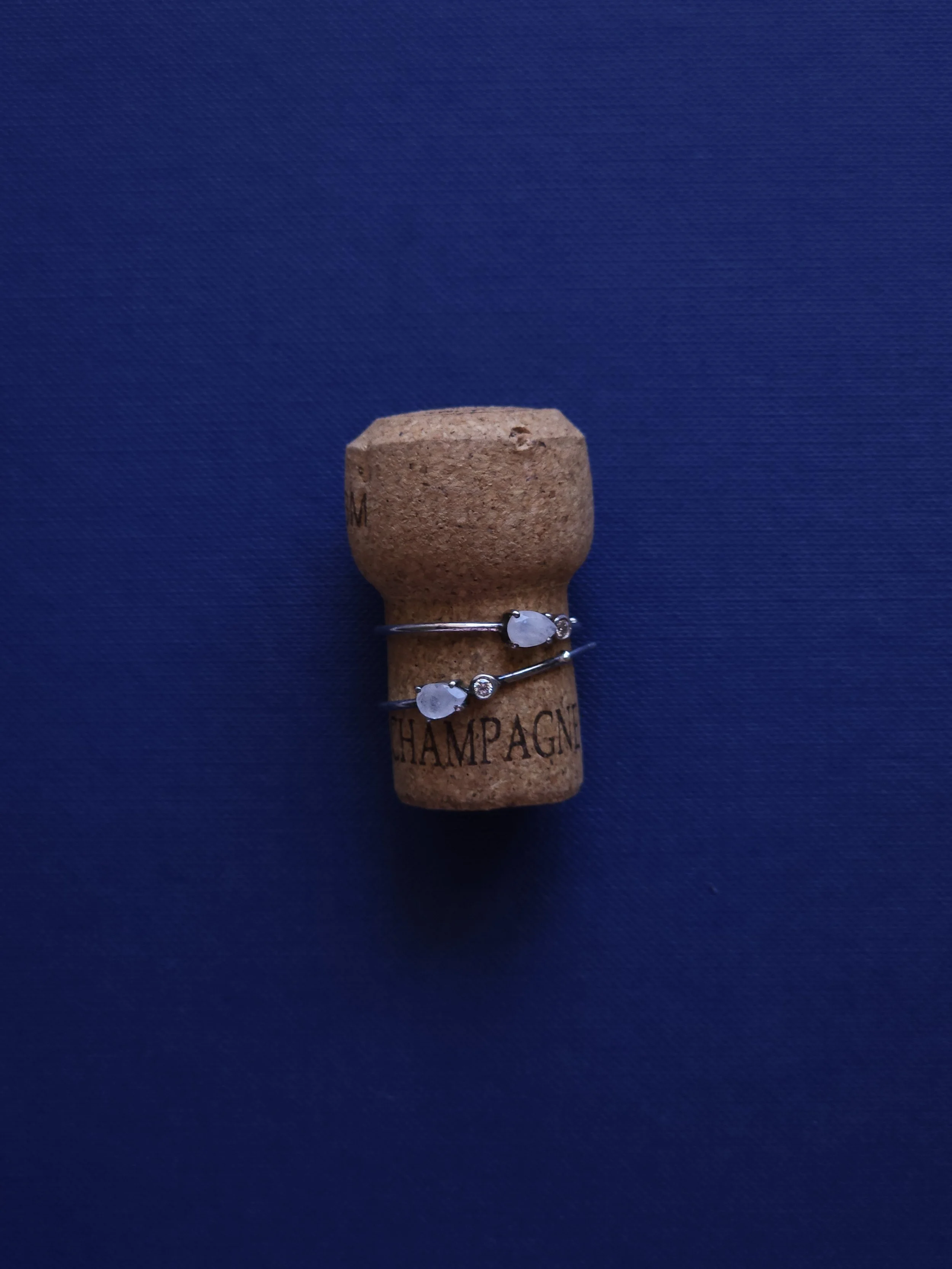 Cork with diamond earrings
