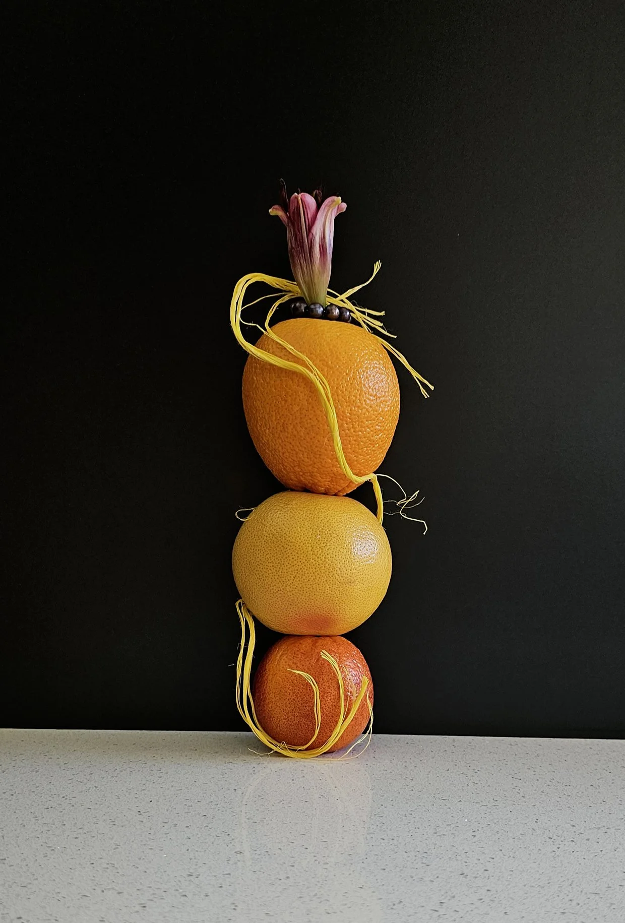 freshwater cultured black pearls with citrus