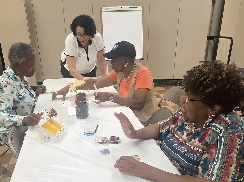 Playing games during a Memory Cafe at the Grace Baptist Church of Germantown