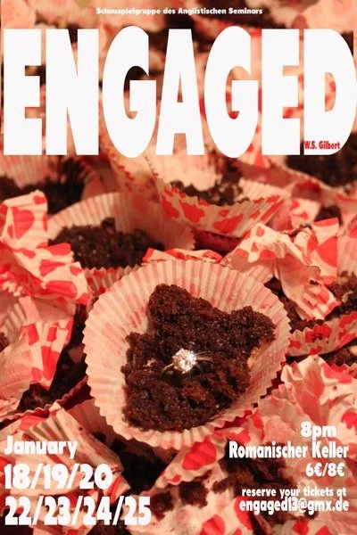 Close-up view of chocolate cupcakes with crumbs and a paper cupcake liner, near the cover text of a book titled "ENGAGED" by W.S. Gilbert, promoting performances in January on specific dates at a Romanesque cellar at 8 pm, with ticket reservation details.