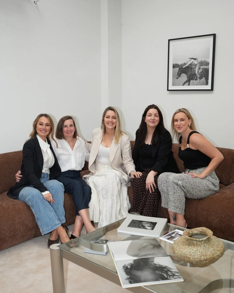 Club Room members together on the sofa