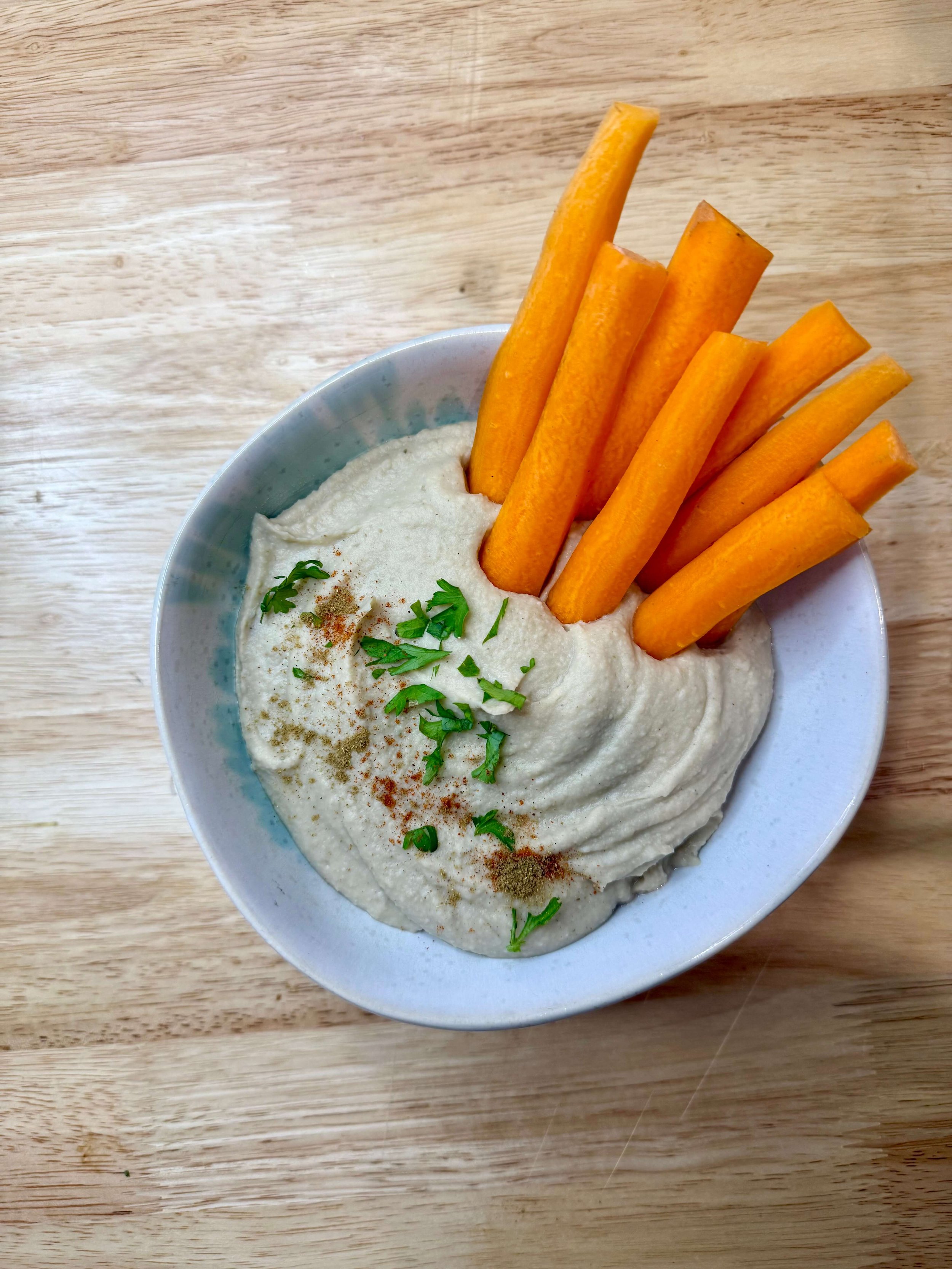 a bowl of bean dip made from navy beans, a type of white bean