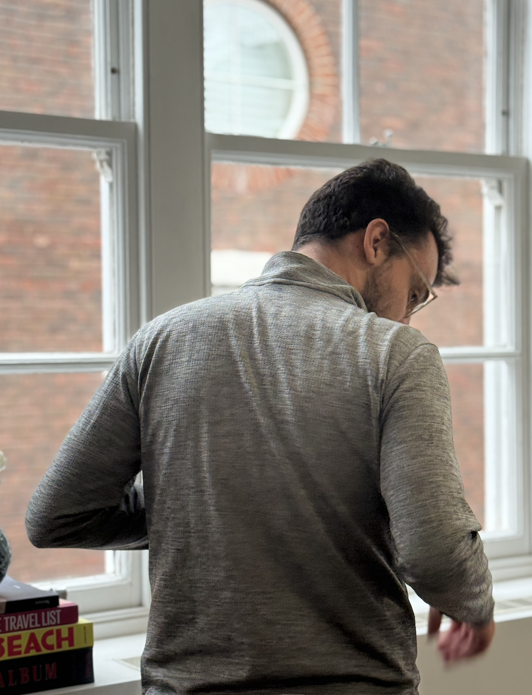 A man with glasses try to understande male pelvic health