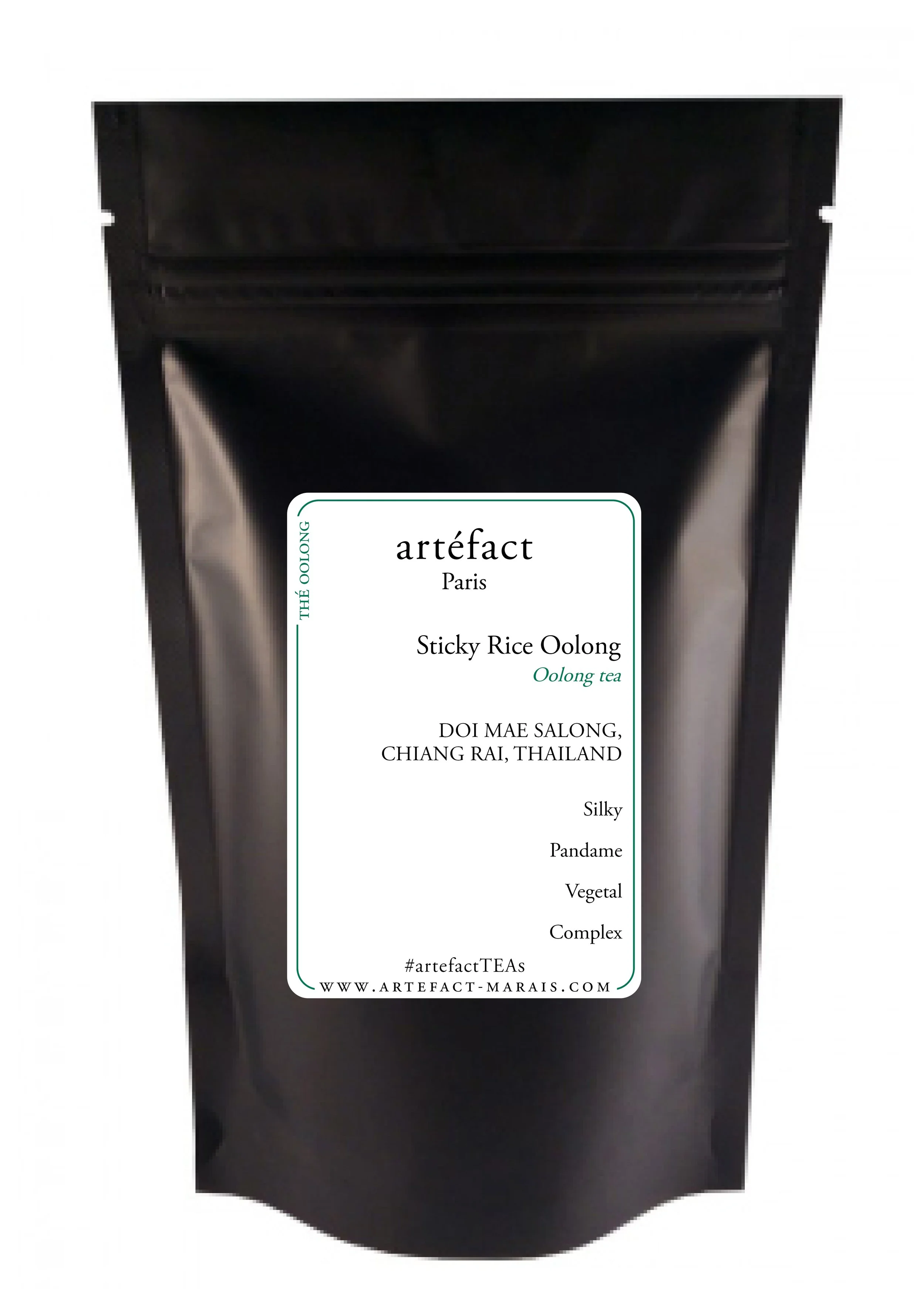 Black bag of Artefact Paris Sticky Rice Oolong tea with a white label listing ingredients and website.