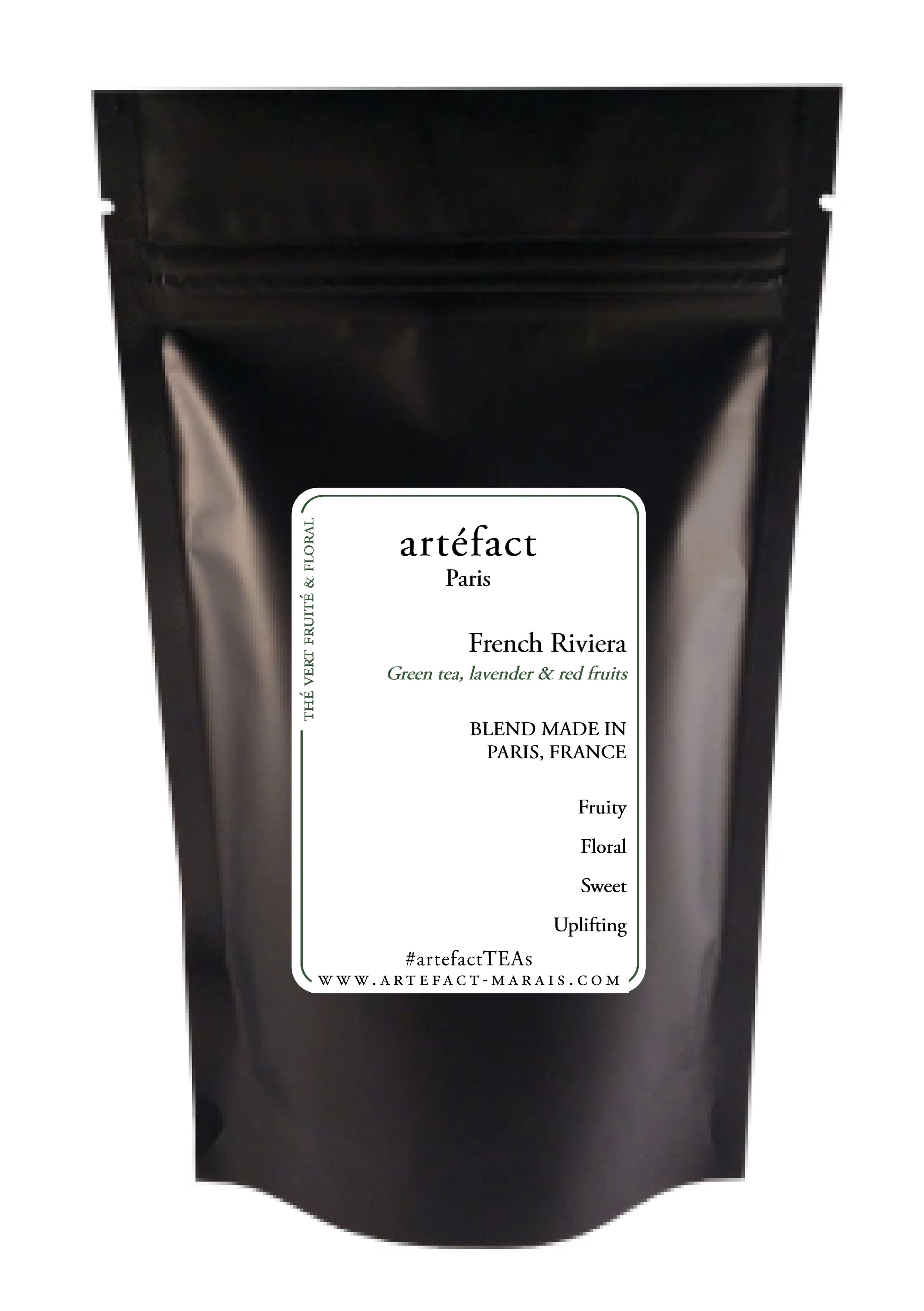Black packaging bag with a white label displaying the brand 'artéfact Paris', description of green tea with lavender and red fruits, and details about the product's origin and flavor profile.