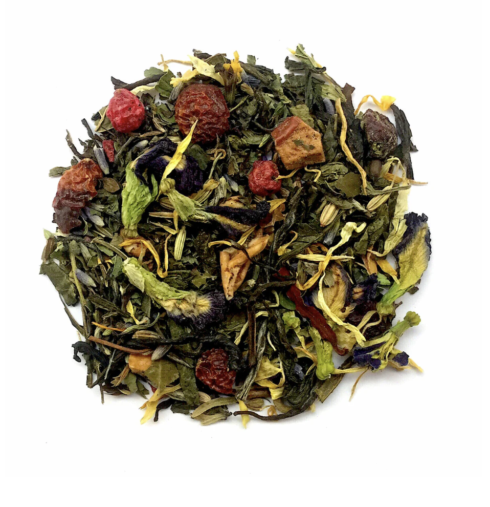 Loose herbal tea blend with dried leaves, berries, and flower petals on a white background.