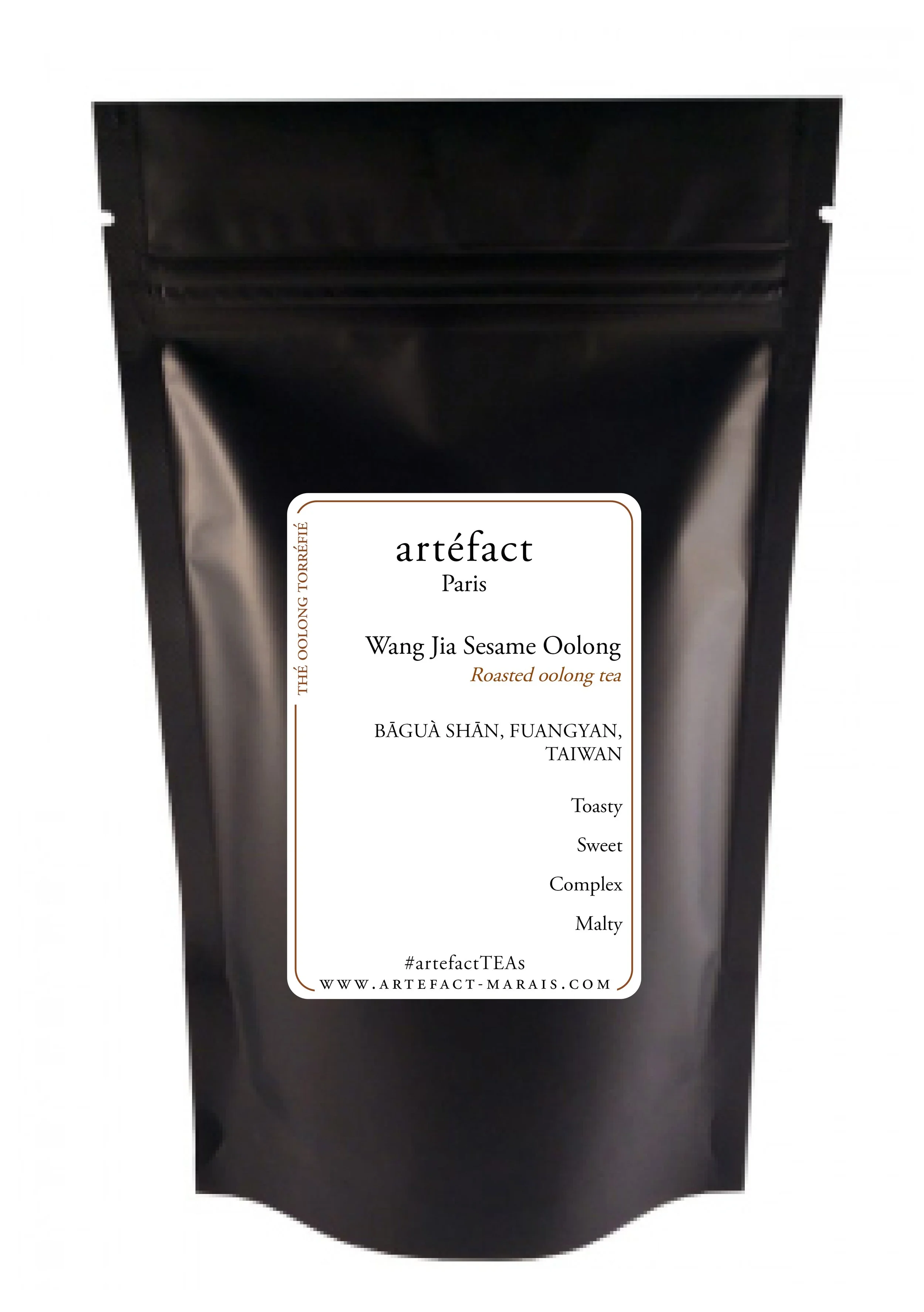 Black packaging bag labeled 'artefact Paris Wang Jia Sesame Oolong Roasted Oolong Tea' from Taiwan.