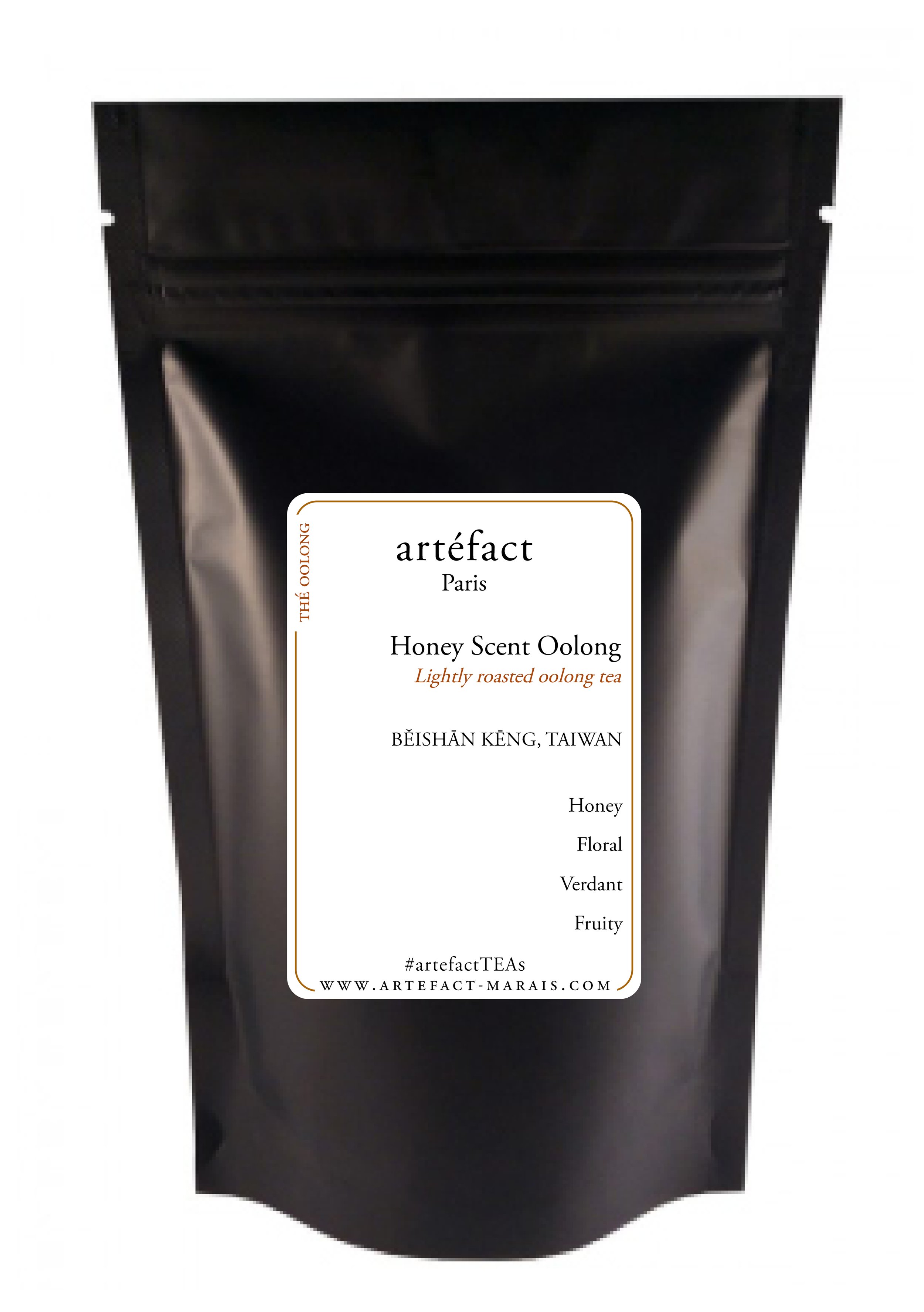 Black package of Artefact Honey Scent Oolong tea with white label and black text, located on a white background.