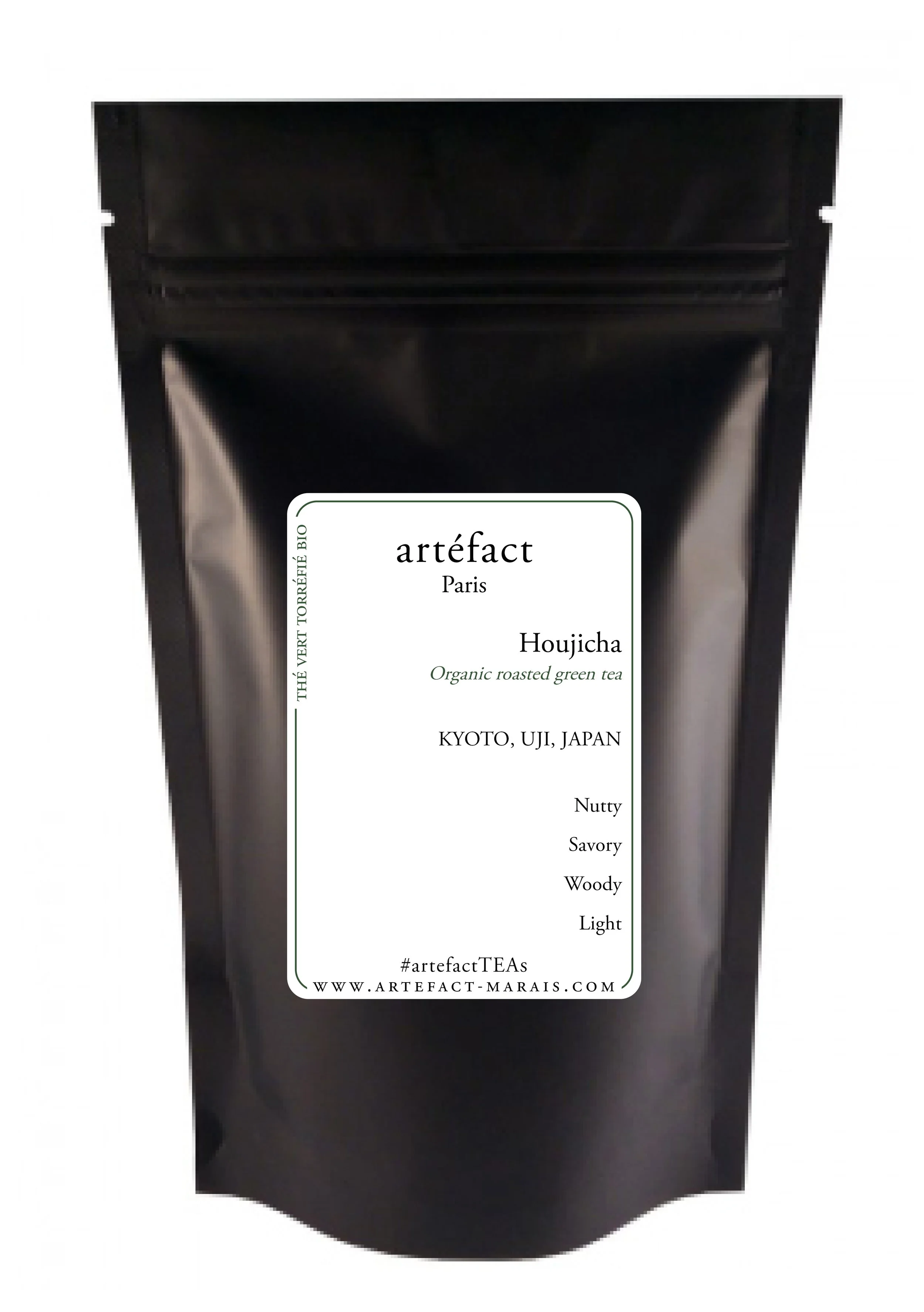 Black package of organic roasted green tea labeled 'Houjicha' from Kyoto, Uji, Japan. The package has a white label with green text and a web address at the bottom.